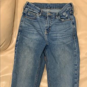 High rise ripped knee blue jeans